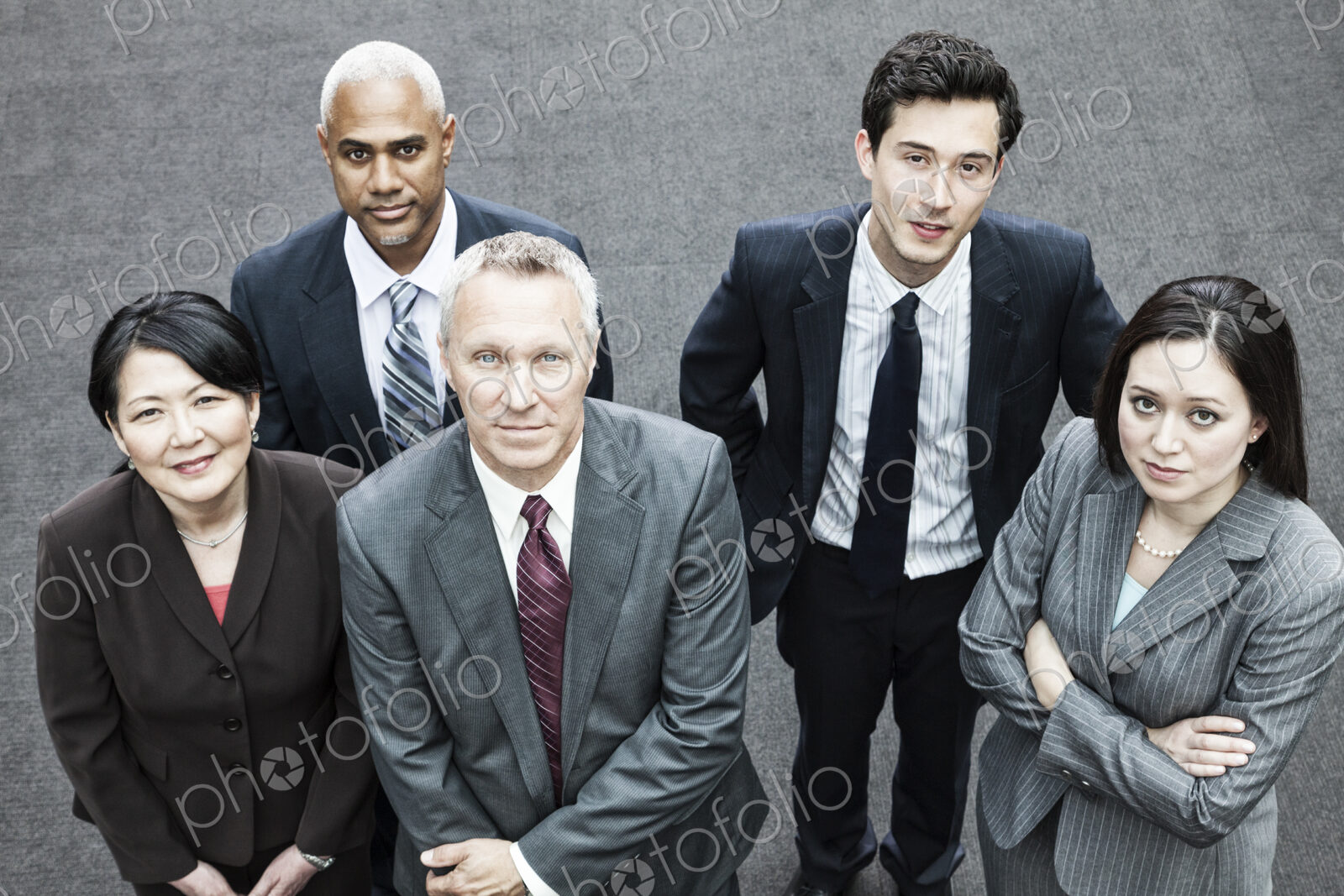 Closeup of a mixed race group of business people