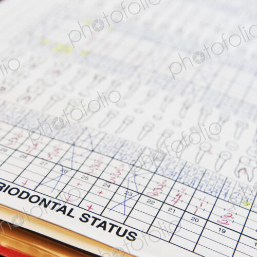 Closeup of dental records for a typical patient. Closeup of dental records for a typical patient.