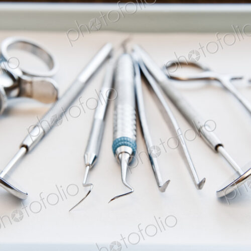 Closeup of medical tools on a tray in a dental surgery. Closeup of medical tools on a tray in a dental surgery.