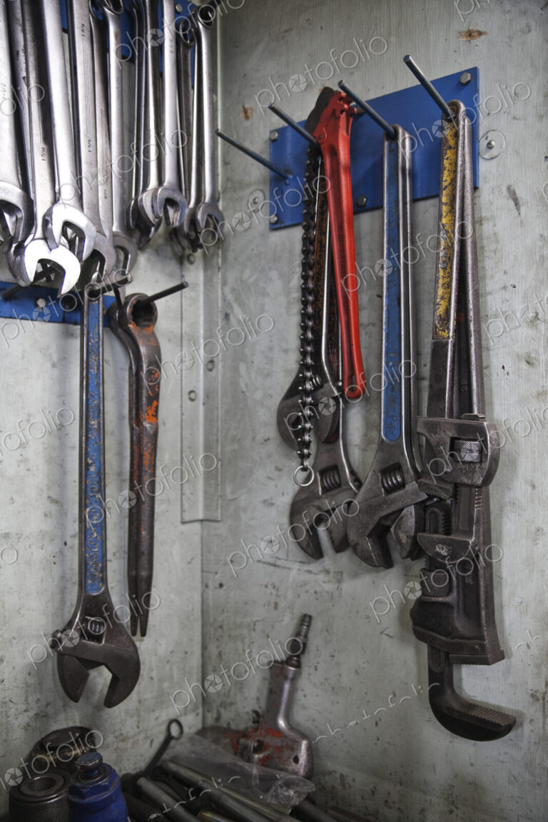 Closeup still life of tools used in a sheet metal factory.