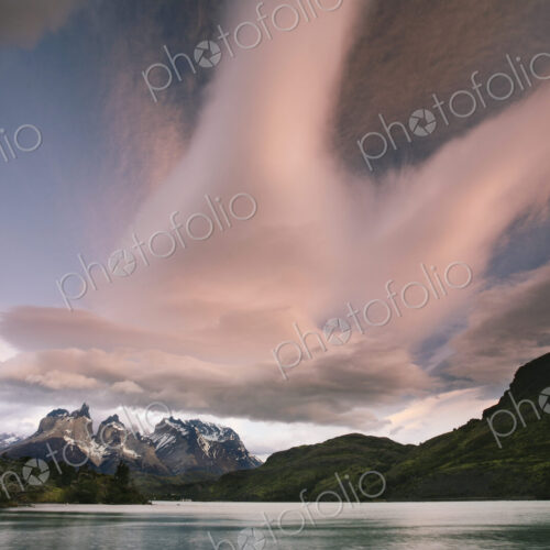 Cloud formations in the skies above the Torres del Paine National Park in Chile.…