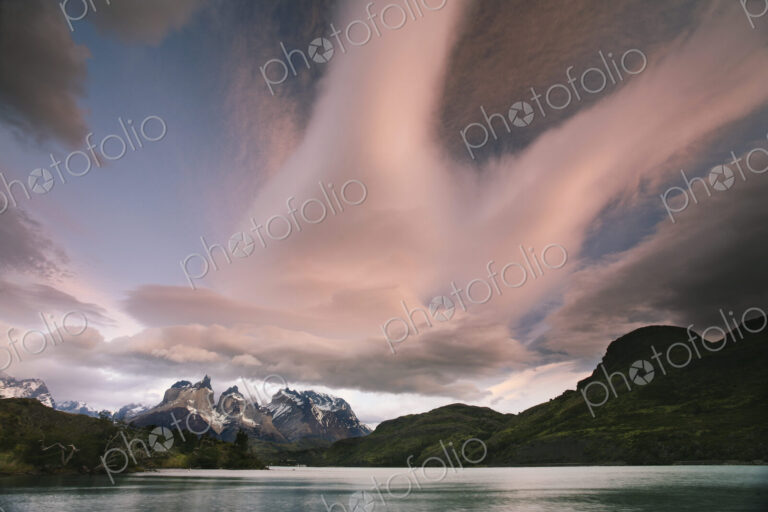 Cloud formations in the skies above the Torres del Paine National Park in Chile.…