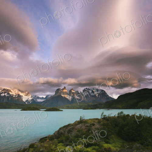 Cloud formations in the skies above the Torres del Paine National Park in Chile.…