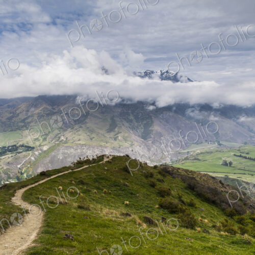 Clouds over mountain range, South Island, New Zealand Clouds over mountain range, South Island, New Zealand