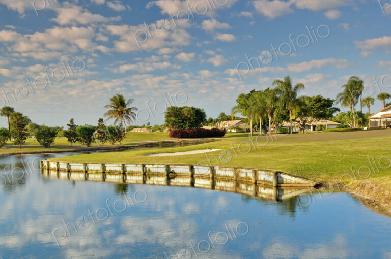 Clouds reflected in calm pond