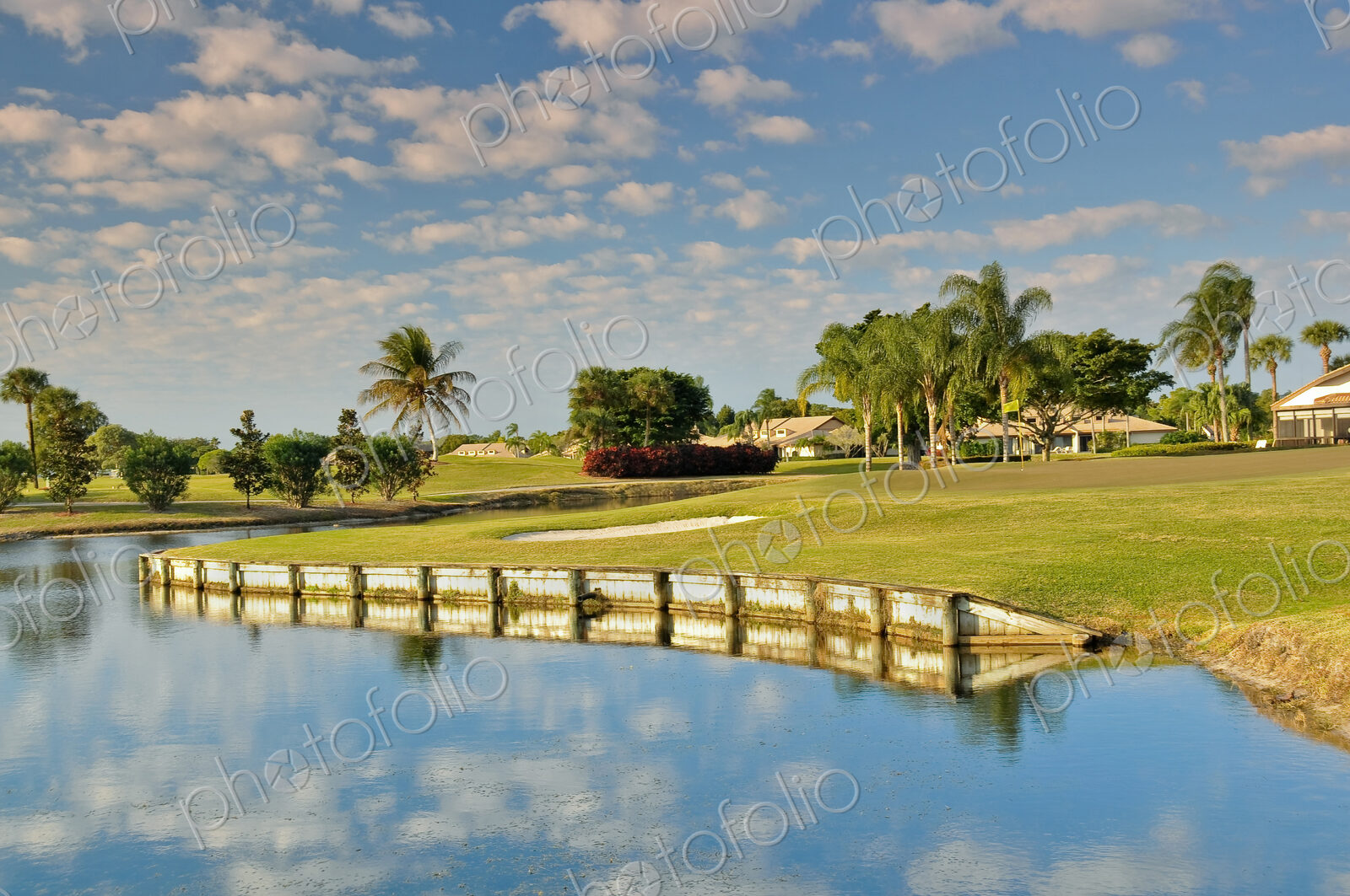 Clouds reflected in calm pond