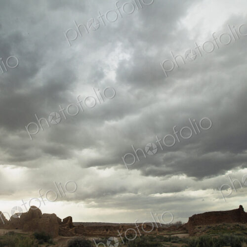 Cloudy sky over rock formations, Chaco Canyon, New Mexico, United States Cloudy sky over rock formations, Chaco Canyon, New Mexico, United States