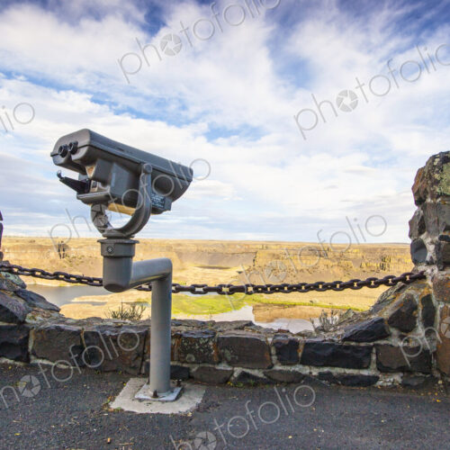 Coin operated tourist telescope at a viewing platform in Dry Falls State Park Coin operated tourist telescope at a viewing platform in Dry Falls State Park