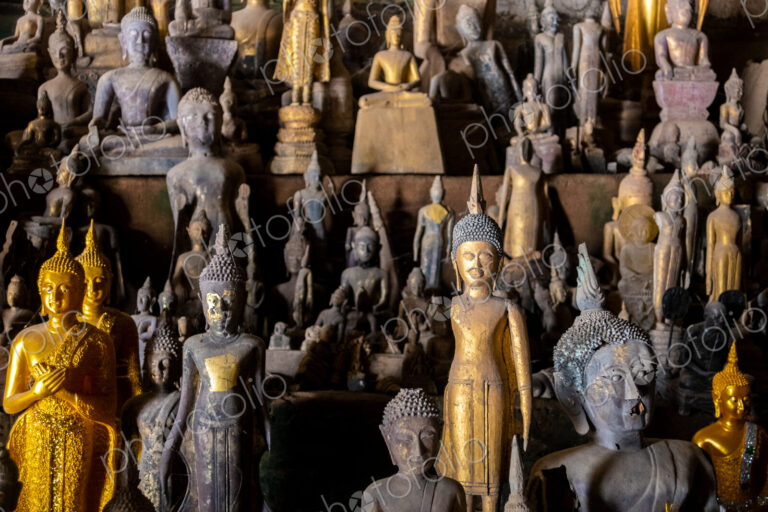 Collection of Buddha Statues Inside Pak Ou Caves, Luang Prabang In Laos
