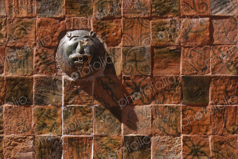 Colorful Tiles and Lion Face Fountain