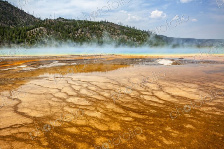 Colorful bacteria mat surrounding Grand Prismatic Spring, Midway Geyser Basin,…