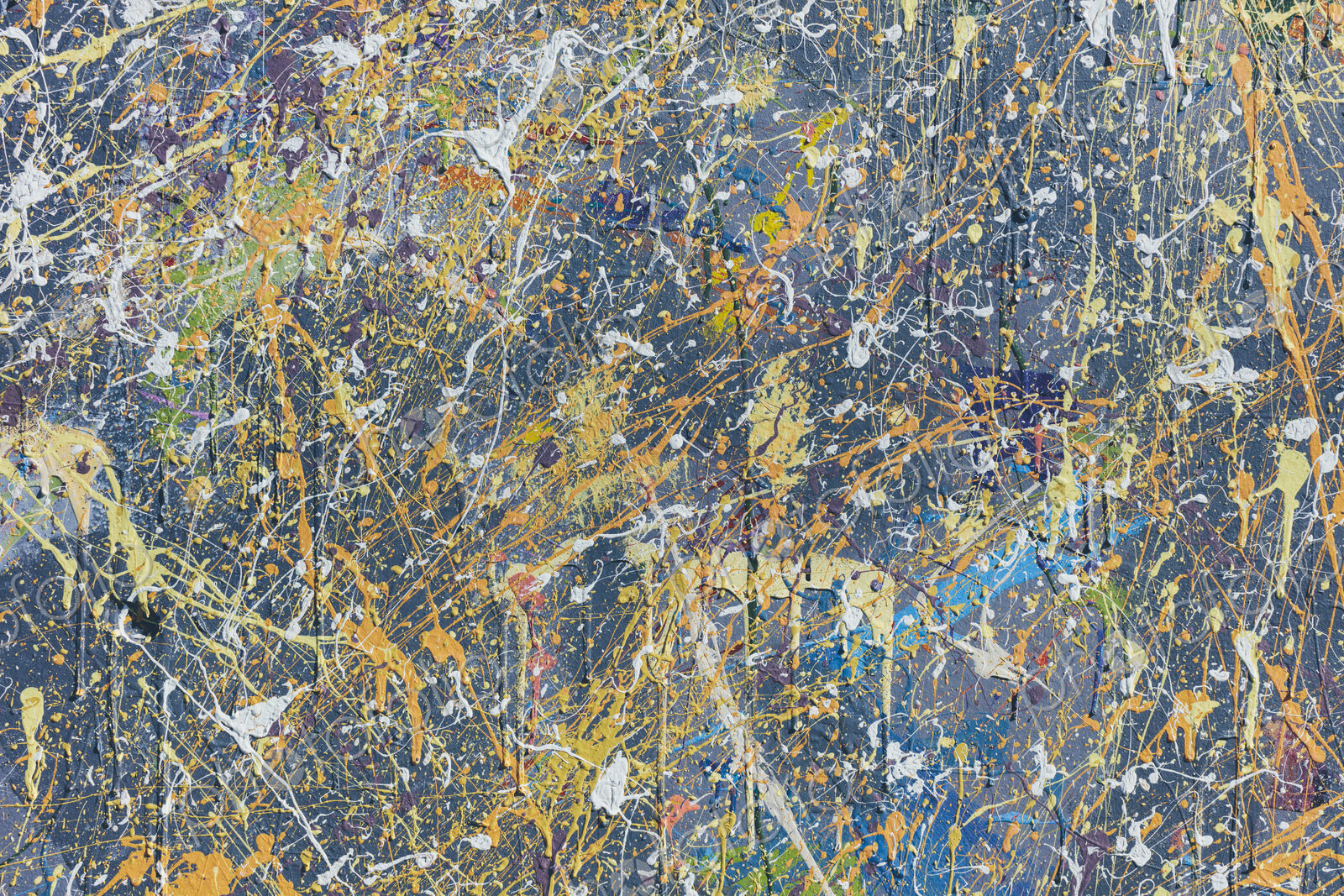 Colorful graffiti paint splattered and dripping on urban wall, close up