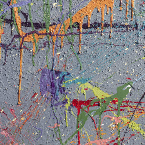 Colorful graffiti paint splattered and dripping on urban wall, close up Colorful graffiti paint splattered and dripping on urban wall, close up