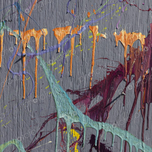 Colorful graffiti paint splattered and dripping on urban wall, close up Colorful graffiti paint splattered and dripping on urban wall, close up
