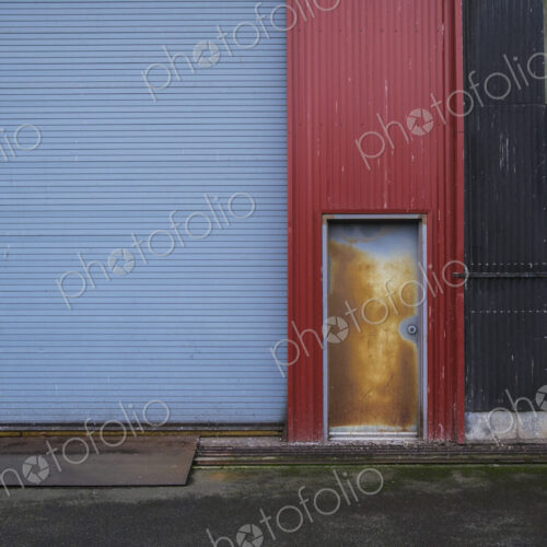 Colorfully painted warehouse exterior, doorway and loading area, Seattle, Washington Colorfully painted warehouse exterior, doorway and loading area, Seattle, Washington