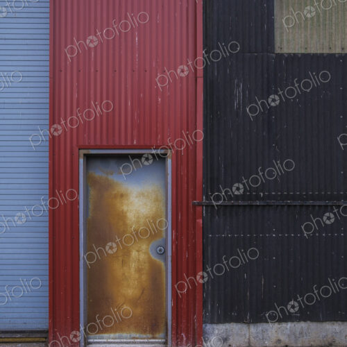 Colorfully painted warehouse exterior, doorway and loading area, Seattle, Washington Colorfully painted warehouse exterior, doorway and loading area, Seattle, Washington