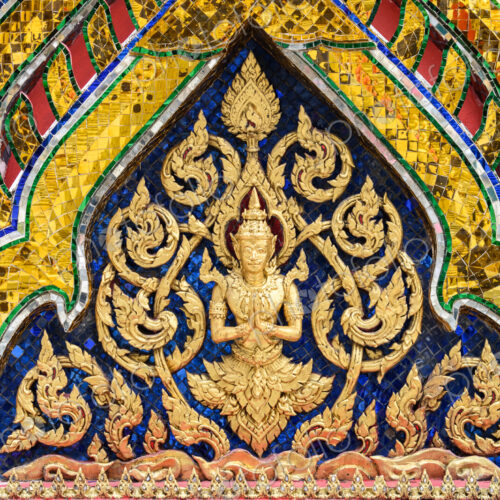 Colourful wall decorations in Wat Phra Kaew. Colourful wall decorations in Wat Phra Kaew.