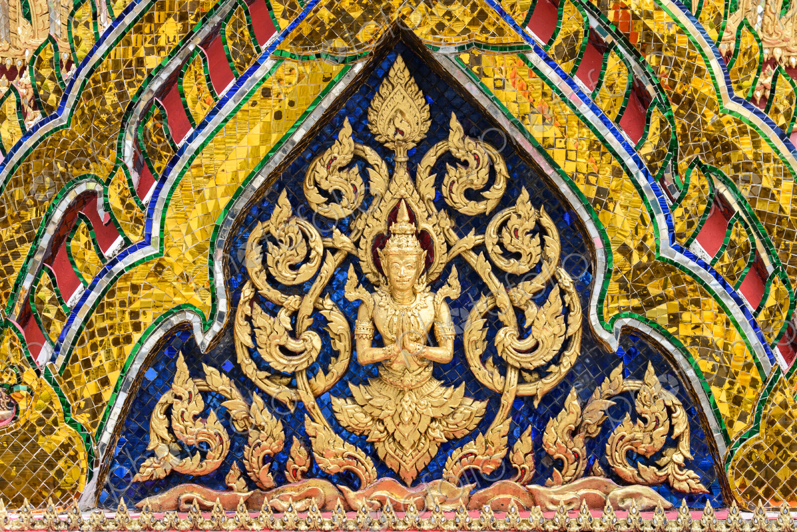 Colourful wall decorations in Wat Phra Kaew.