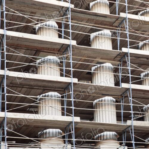 Columns of a public building covered in scaffolding, Sacramento, California.