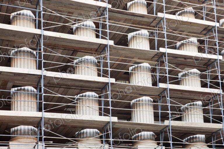 Columns of a public building covered in scaffolding, Sacramento, California.