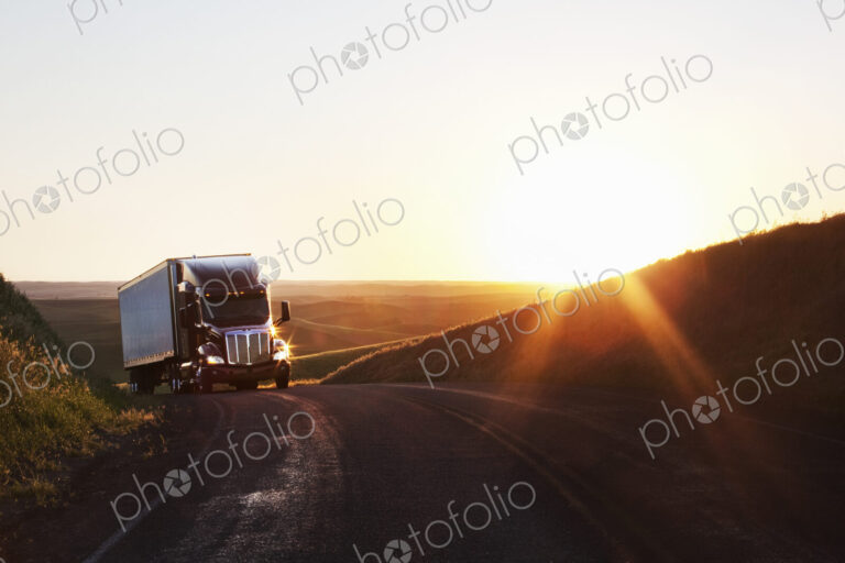 Commercial truck cresting a hill in the farm country of eastern Washington, USA
