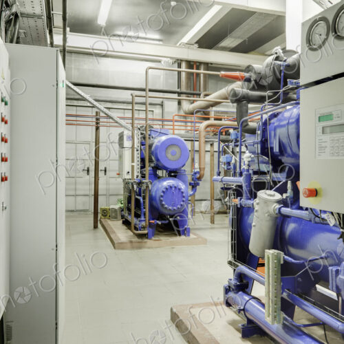 Compressor station in an ice rink, machinery used for rink ice cooling. Machine… Compressor station in an ice rink, machinery used for rink ice cooling. Machine…