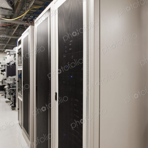 Computer servers in cabinet. Computer servers in cabinet.