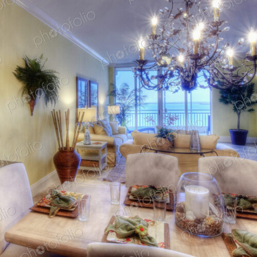 Condominium Interior, a living and dining area, in a luxury apartment, with an ocean view. Condominium Interior, a living and dining area, in a luxury apartment, with an ocean view.