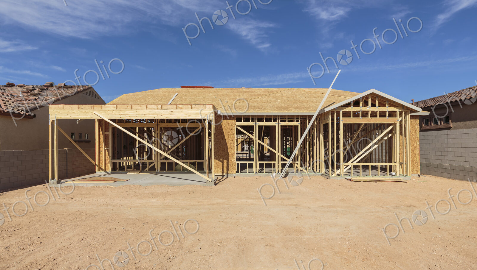 Construction of house under blue sky