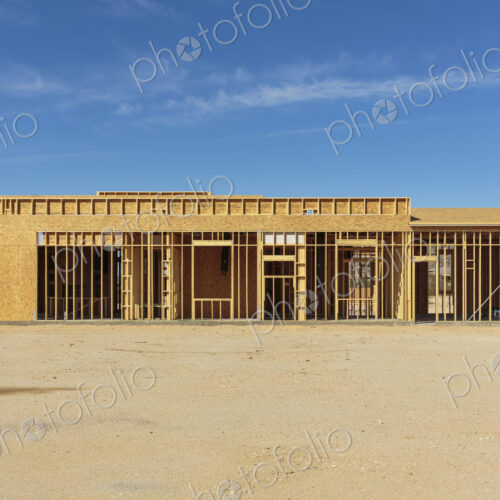 Construction of house under blue sky