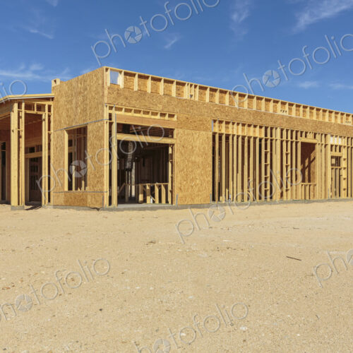 Construction of house under blue sky