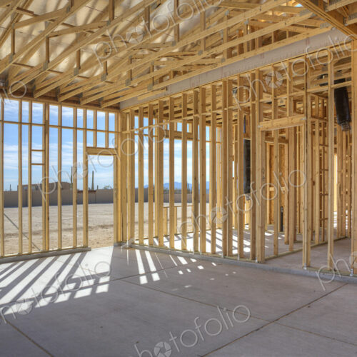 Construction of house under blue sky