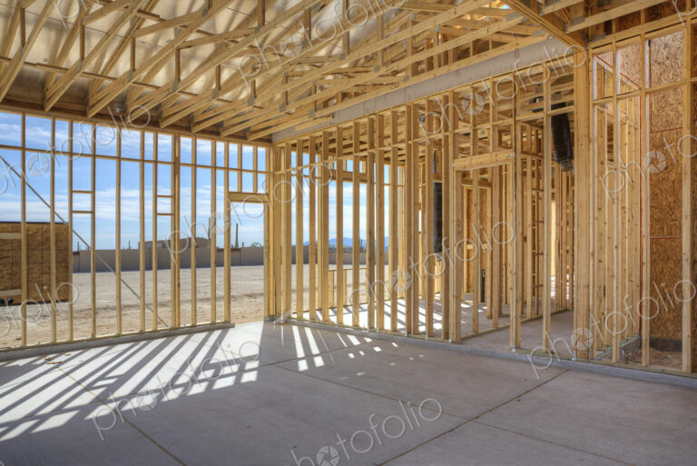 Construction of house under blue sky