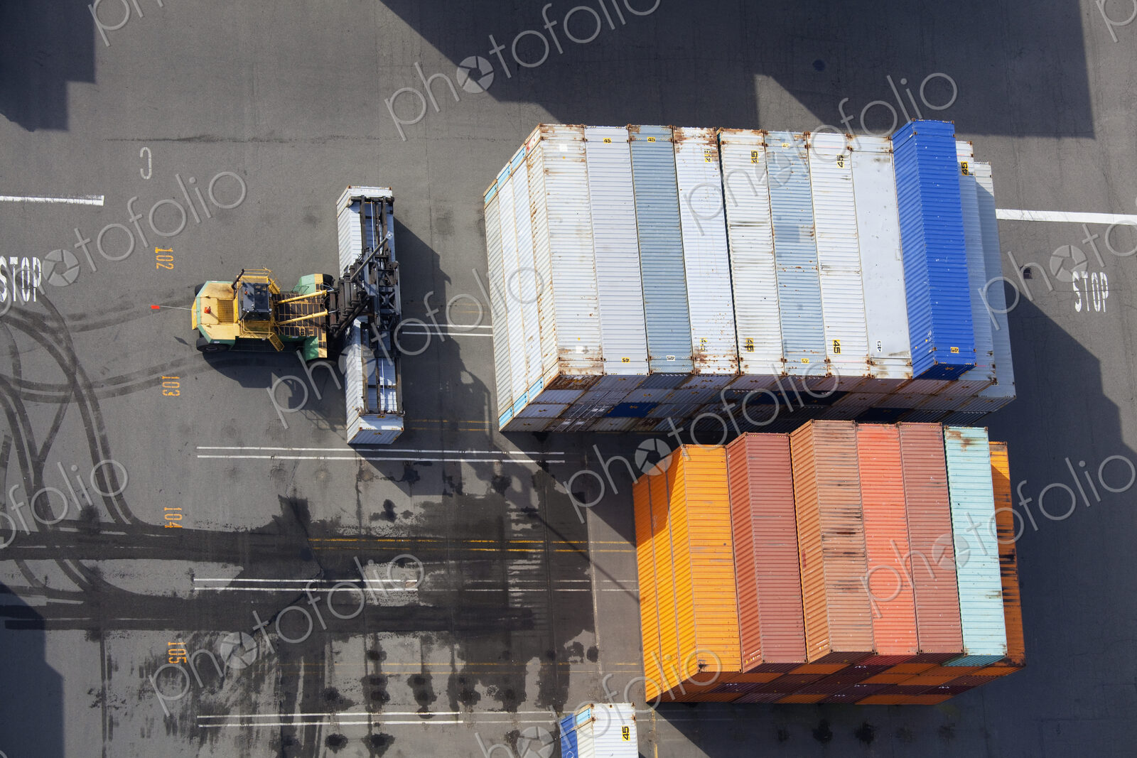 Containers Moved by a Mast Forklift