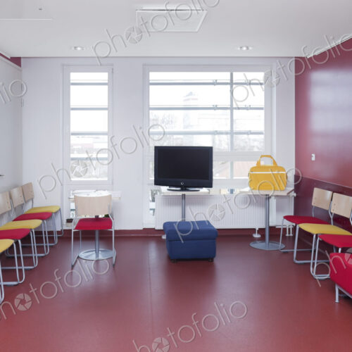 Corridor and waiting areas of a modern hospital with seating Yellow bag. Corridor and waiting areas of a modern hospital with seating Yellow bag.