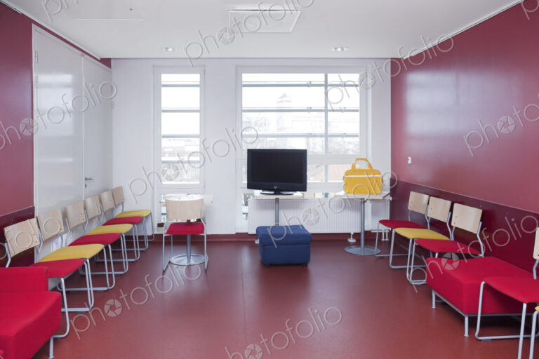 Corridor and waiting areas of a modern hospital with seating Yellow bag.
