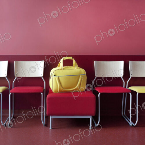 Corridor and waiting areas of a modern hospital with seating Yellow bag. Corridor and waiting areas of a modern hospital with seating Yellow bag.