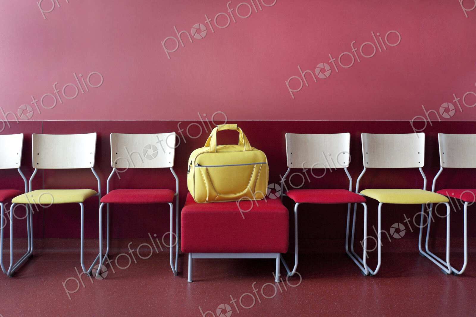 Corridor and waiting areas of a modern hospital with seating Yellow bag.