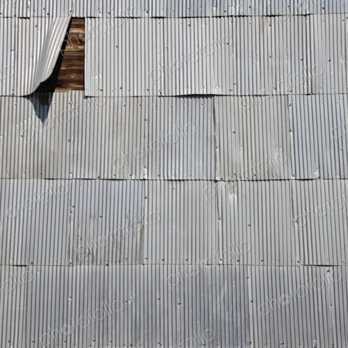 Corrugated Shingles on a Wooden Wall Corrugated Shingles on a Wooden Wall
