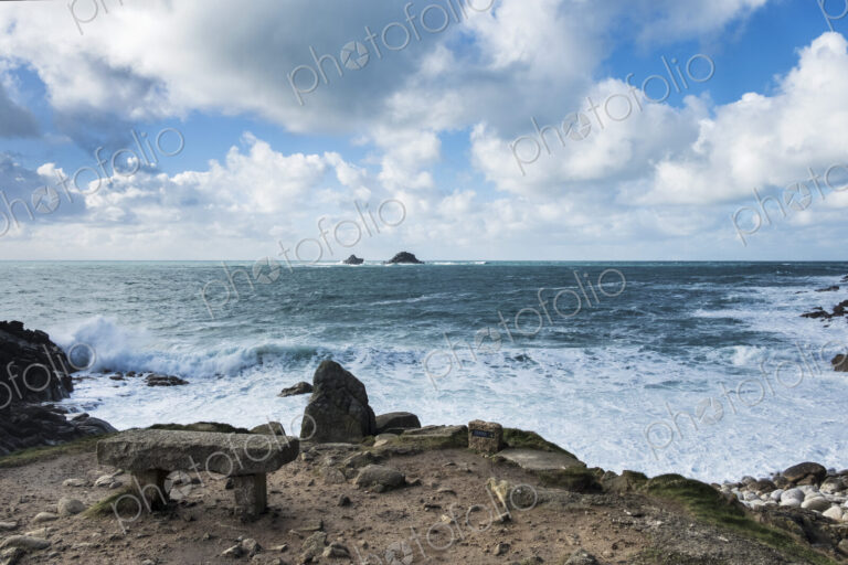 Cot Valley and coastline at Porth Nanven Cove and the Brisons Rocks offshore on the…