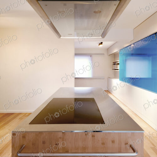 Counter and ventilation hood in modern kitchen