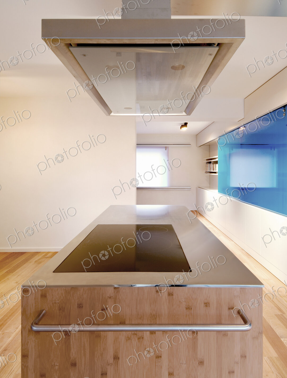 Counter and ventilation hood in modern kitchen