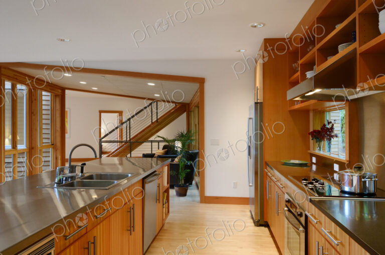 Counter tops, stove and sink in kitchen