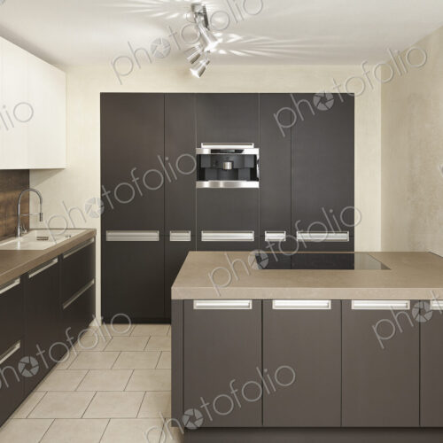 Counters and cabinets in modern kitchen