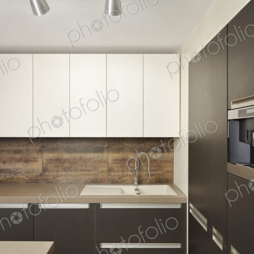 Counters and cabinets in modern kitchen
