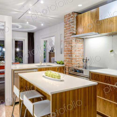 Countertops and breakfast bar in modern kitchen