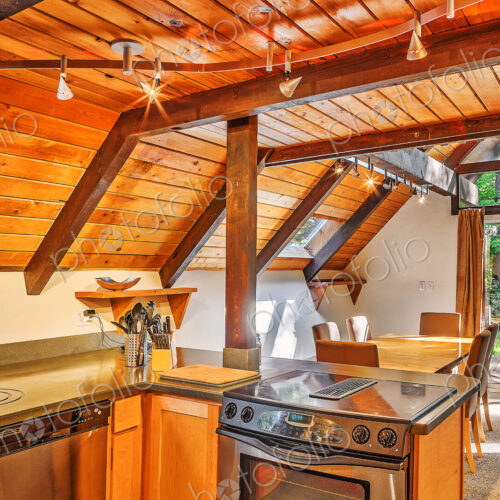 Countertops and dining area in rustic kitchen
