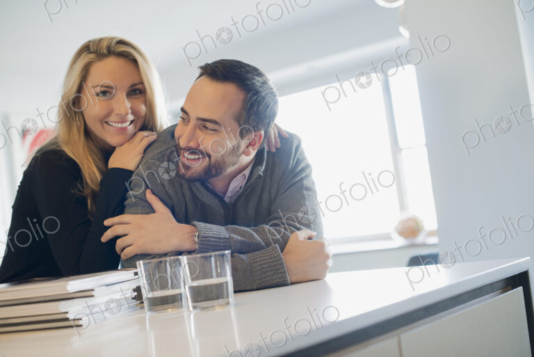 Couple at home in modern kitchen
