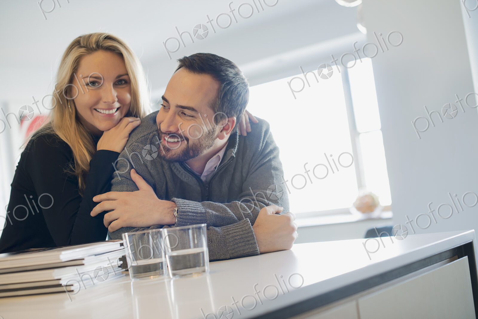 Couple at home in modern kitchen