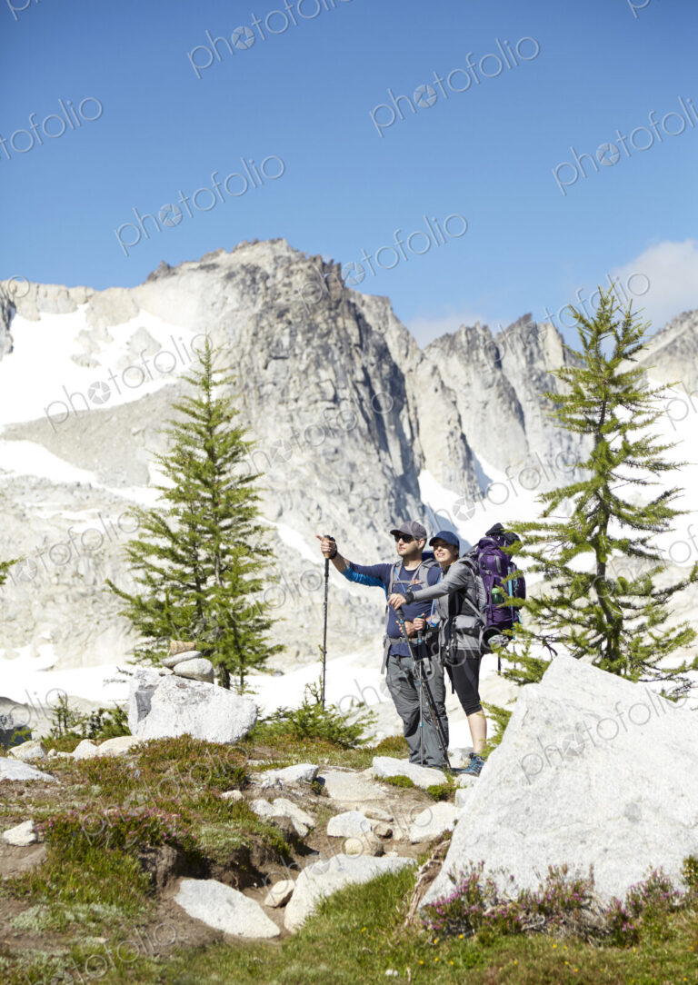 Couple hiking in remote mountains